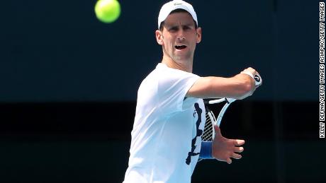 Novak Djokovic practices in Rod Laver Arena ahead of the 2022 Australian Open at Melbourne Park on January 11, 2022.