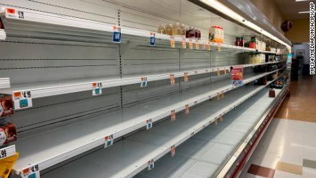A view of empty shelves at a local Giant's supermarket on January 9, 2022 in Alexandria, Virginia. 