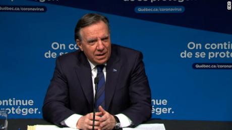 Quebec premier drops 'unvaxxed tax' plan, saying it 'divided' people