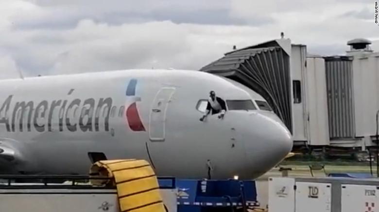 Man storms cockpit on American Airlines flight, breaks controls - CNN Video