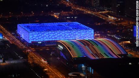 The National Aquatics Center (left) and the National Indoor Stadium (right) will both host events during the Winter Olympics. 