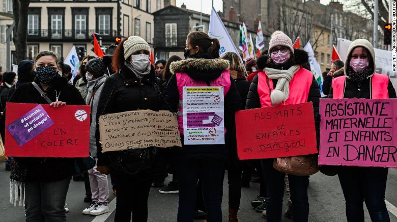 Demonstrators gather in the city of Clermont-Ferrand on Thursday as French teacher and student unions call for a national strike in protest over the government&#39;s Covid-19 protocols for schools.