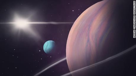 Astronomers have detected a second exomoon candidate (depicted in blue) orbiting a giant exoplanet (right) more than 5,000 light-years from Earth. 