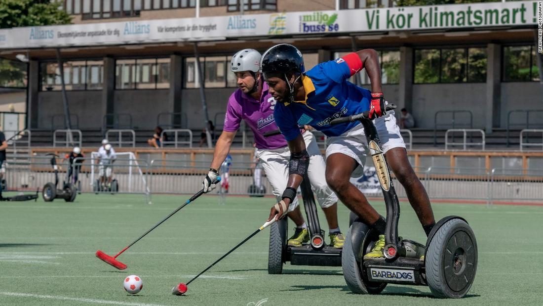 Segway polo is like regular polo, but instead of horses, players ride two-wheeled electric Segways. The Segway Polo Club of Barbados, pictured in blue, won the 2019 World Championship. 