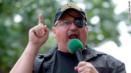 In this Sunday, June 25, 2017 file photo, Stewart Rhodes, founder of the citizen militia group known as the Oath Keepers speaks during a rally outside the White House in Washington. 