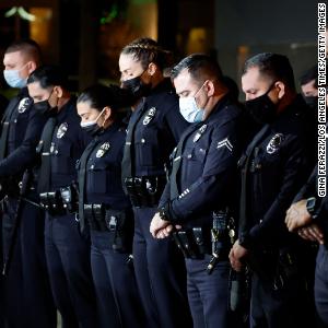 3 alleged gang members and an associate charged in the fatal shooting of an off-duty LAPD officer