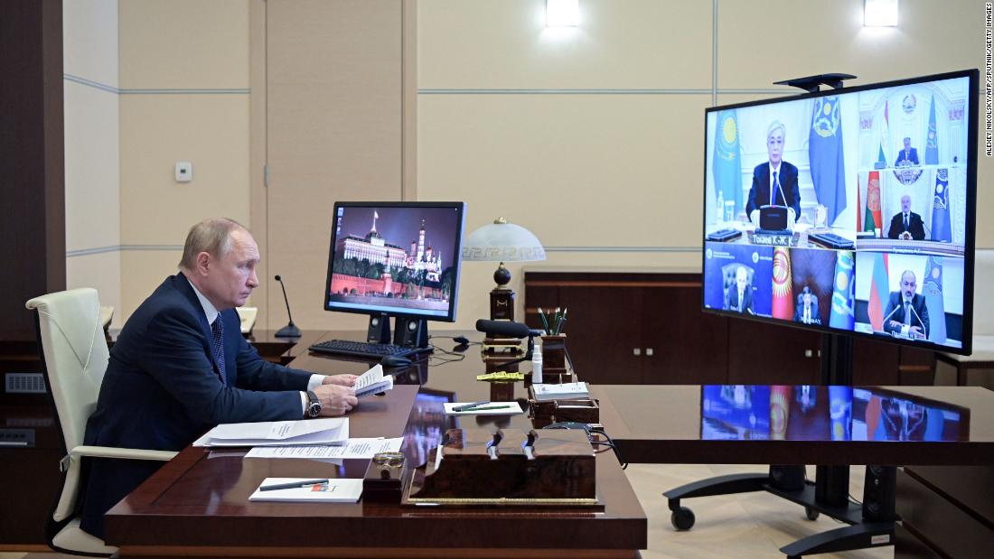 Russian President Vladimir Putin attends a video emergency meeting January 10 discussing the situation in Kazakhstan.