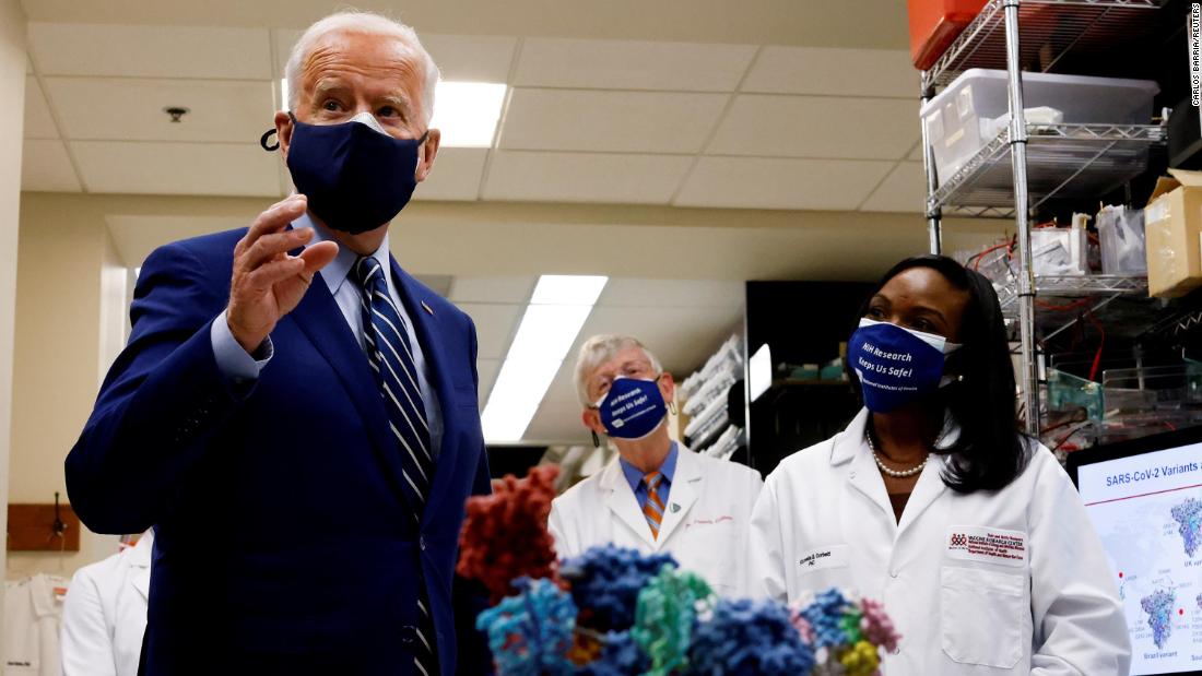 Biden visits a lab February 11 at the National Institutes of Health in Bethesda, Maryland. &lt;a href=&quot;https://www.cnn.com/2021/02/11/politics/joe-biden-vaccine-distribution-trump-administration/index.html&quot; target=&quot;_blank&quot;&gt;He gave a speech at the NIH that day&lt;/a&gt; and announced that by the end of July, the United States would have enough Covid-19 vaccines for 300 million Americans.&lt;br /&gt;&lt;br /&gt;&quot;The idea of being inside such an important research facility, where so many different viruses have been studied and stored, made the visit — and the gravity of the pandemic — very real,&quot; Reuters photographer Carlos Barria recalled.&lt;br /&gt;&lt;br /&gt;One of Biden&#39;s first major promises was to administer 100 million doses within his first 100 days in office, a mission that he said was dependent on major production increases and health-care coordination. The administration &lt;a href=&quot;https://edition.cnn.com/world/live-news/coronavirus-pandemic-vaccine-updates-03-19-21/h_d8e373aef4a4d10dc04a5ec35e32edeb&quot; target=&quot;_blank&quot;&gt;surpassed that goal&lt;/a&gt; by mid-March, weeks ahead of schedule.