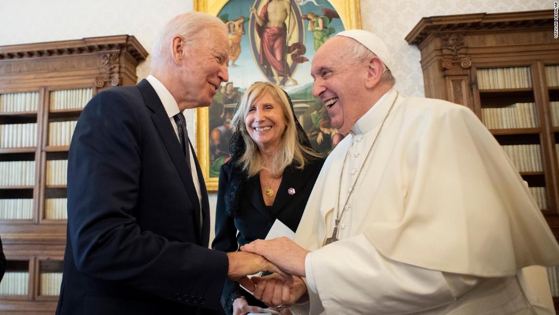 Biden gives Pope Francis a challenge coin during &lt;a href=&quot;https://www.cnn.com/2021/10/29/politics/pope-francis-joe-biden-meeting/index.html&quot; target=&quot;_blank&quot;&gt;his trip to the Vatican&lt;/a&gt; on October 29. Between them is Italian translator Elisabetta Savigni Ullmann. &lt;br /&gt;&lt;br /&gt;Challenge coins originated in the military, and &lt;a href=&quot;https://www.cnn.com/2021/10/29/politics/challenge-coin-joe-biden-pope-francis/index.html&quot; target=&quot;_blank&quot;&gt;this one&lt;/a&gt; included the insignia of a Delaware Army National Guard unit that Biden&#39;s son Beau served in. &lt;br /&gt;&lt;br /&gt;Biden said during his visit that coins are given to &quot;warriors and leaders&quot; and that the pope is &quot;the most significant warrior for peace I&#39;ve ever met.&quot; &lt;br /&gt;&lt;br /&gt;Biden, a devout lifelong Catholic, met with the Pope for 90 minutes and said he discussed &quot;a lot of personal things&quot; with the pontiff. It was the fourth meeting between Francis and Biden, but their first since Biden became President.