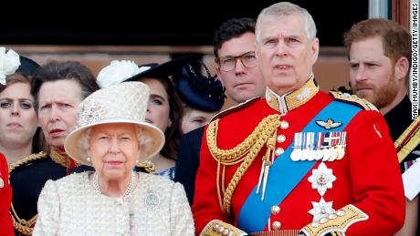 LONDON, UNITED KINGDOM - JUNE 08: (EMBARGOED FOR PUBLICATION IN UK NEWSPAPERS UNTIL 24 HOURS AFTER CREATE DATE AND TIME) Queen Elizabeth II and Prince Andrew, Duke of York (wearing the uniform of Colonel of the Grenadier Guards) watch a flypast from the balcony of Buckingham Palace during Trooping The Colour, the Queen&#39;s annual birthday parade, on June 8, 2019 in London, England. The annual ceremony involving over 1400 guardsmen and cavalry, is believed to have first been performed during the reign of King Charles II. The parade marks the official birthday of the Sovereign, although the Queen&#39;s actual birthday is on April 21st. (Photo by Max Mumby/Indigo/Getty Images)