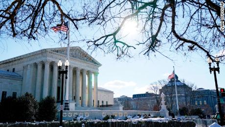 The Supreme Court shown Friday, Jan. 7, 2022, in Washington. The Supreme Court is taking up two major Biden administration efforts to bump up the nation&#39;s vaccination rate against COVID-19 at a time of spiking coronavirus cases because of the omicron variant. 