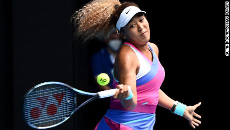 Osaka plays a forehand against Osorio during their women&#39;s singles match on day one of the Australian Open.