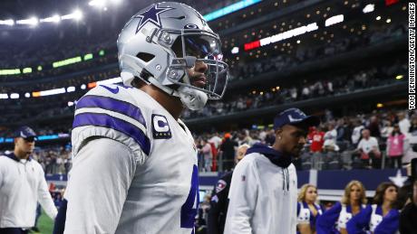 Dallas Cowboys fans throw trash at the refs after heartbreaking NFL playoff loss; Dak Prescott says &#39;credit to them&#39;