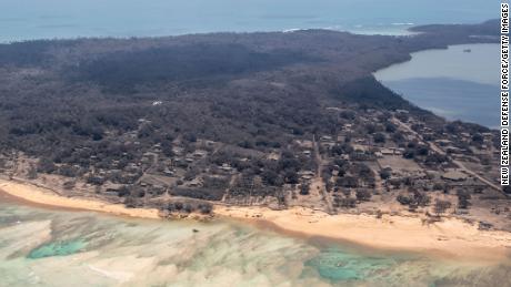 An aerial view from a P-3K2 Orion surveillance flight shows heavy ash fall in Nomuka, Tonga, January 17, 2022. 