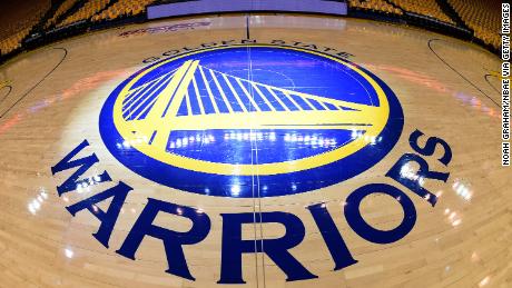 A close-up view of the Warriors team logo.