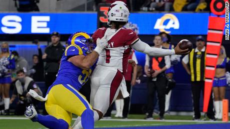 Rams linebacker Troy Reeder pressures Cardinals quarterback Kyler Murray into throwing a pass that was intercepted and returned for a touchdown by David Long Jr.