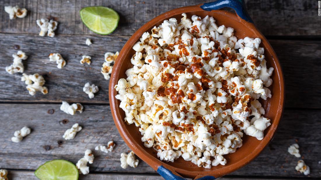 Freshly made popcorn spiked with fresh lime juice and zest is a tangy treat, inspired by Mexican flavors.