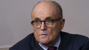 Rudy Giuliani, personal lawyer to U.S. President Donald Trump, listens as President Donald Trump speaks during a news conference in the James S. Brady Press Briefing Room at the White House in Washington, D.C., U.S., on Sunday, Sept. 27, 2020. Trump denied a report that he paid just $750 in federal income taxes in 2016 and 2017, and repeated his stance to only share his tax returns after an audit is finished. Photographer: Chris Kleponis/Polaris/Bloomberg via Getty Images