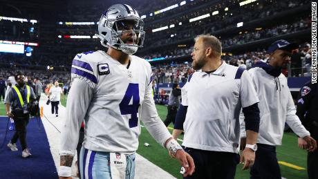 Dak Prescott walks off the field after losing to the San Francisco 49ers in the NFC wild card playoff game.