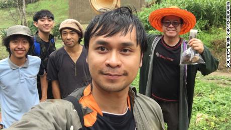 Narin Chomphuphuang, center, takes a photo of the survey team. YouTuber JoCho Sippawat is on the far left. 