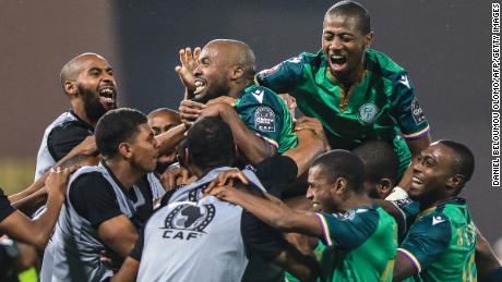Comoros&#39; forward Ahmed Mogni celebrates with teammates after scoring during the win over Ghana.