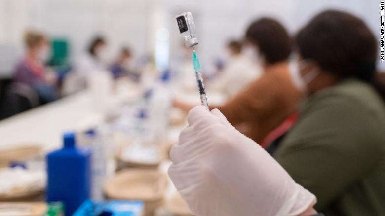 A nurse fills a syringe filled with a Covid-19 vaccine in April in Vienna, Austria.