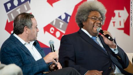 Elie Mystal, right, speaks during a panel about  impeachment at the Politicon convention on October 27, 2019, in Nashville.