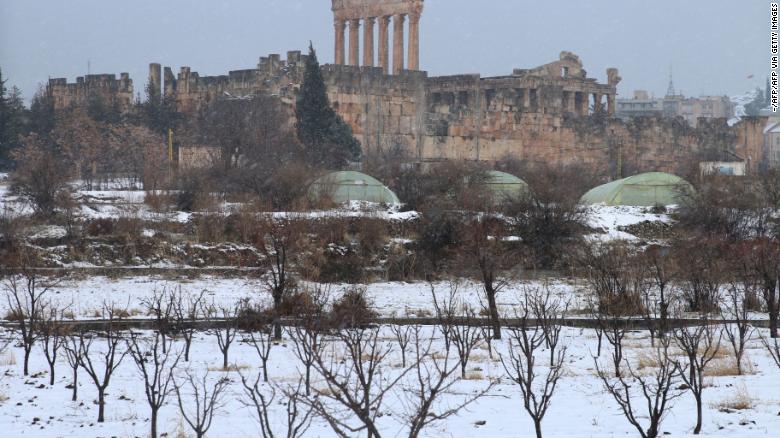 Snow covers the Roman Temple of Jupiter in Lebanon's eastern Bekaa Valley, on Wednesday.