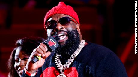 Rick Ross announces his album during a time-out in the game between the Miami Heat and the Boston Celtics at Miami&#39;s FTX Arena on November 4, 2021. 