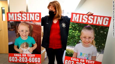 Manchester Police Public Information Officer Heather Hamel holds two reward posters that show missing girl Harmony Montgomery.