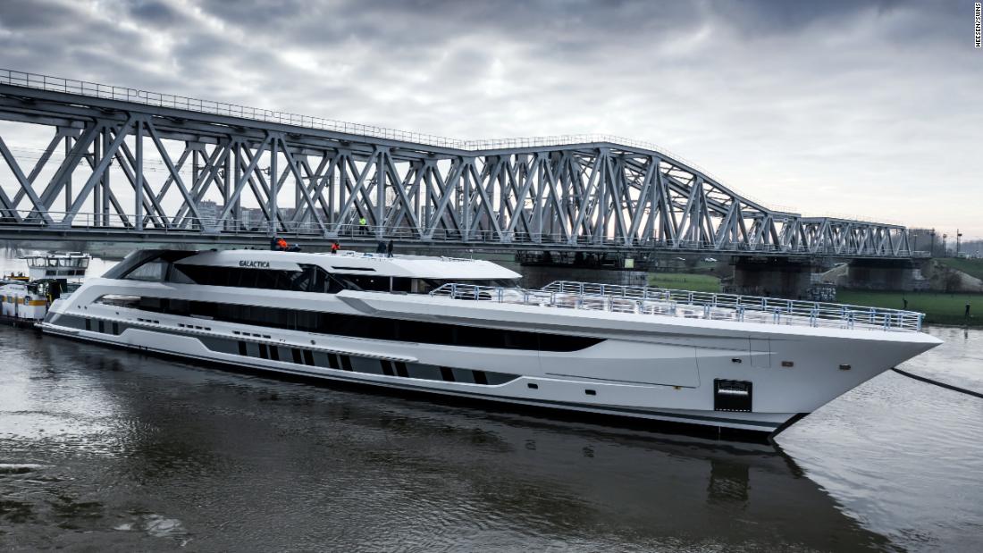 Enormous superyacht squeezes under Dutch bridges