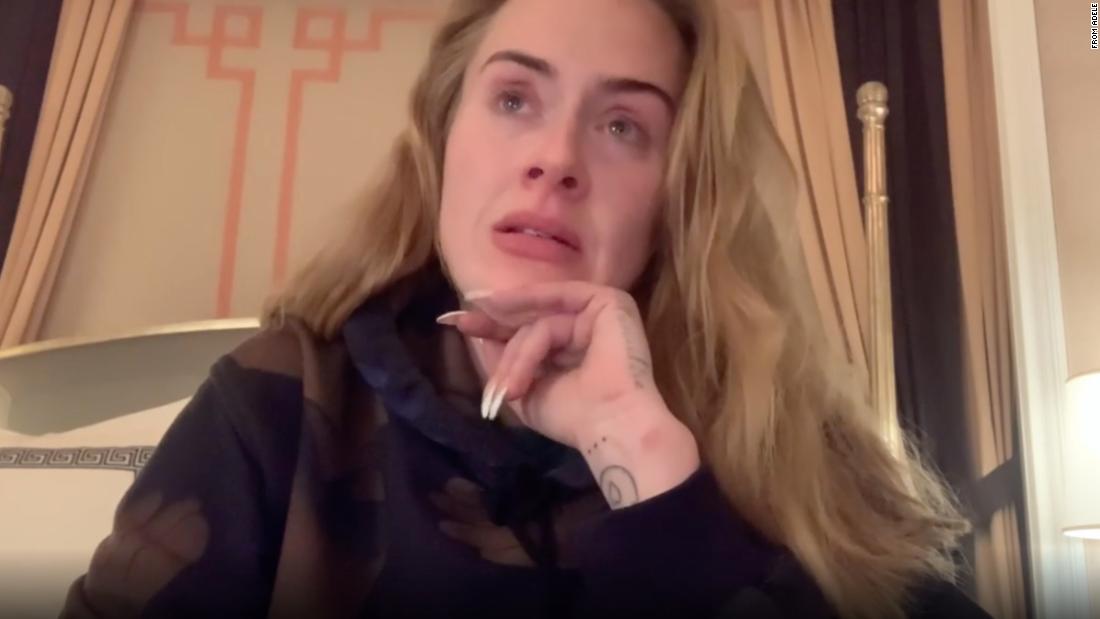 Tearful Adele announces postponement of Vegas residency