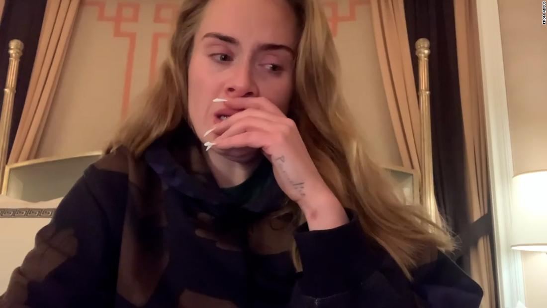 Tearful Adele announces postponement of Las Vegas residency