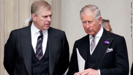 Prince Charles speaks with his younger brother, Prince Andrew, at a thanksgiving event marking the Queen&#39;s Diamond Jubilee in 2012. 