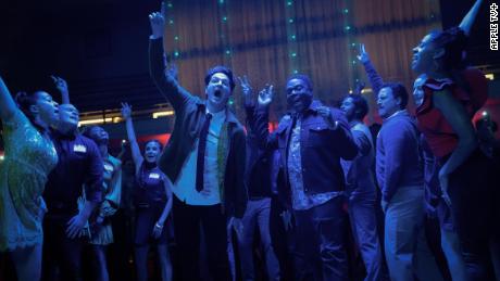 (Center foreground, from left) Ben Schwartz as Yasper and Sam Richardson as Aniq are shown in a scene from &quot;The Afterparty.&quot; 