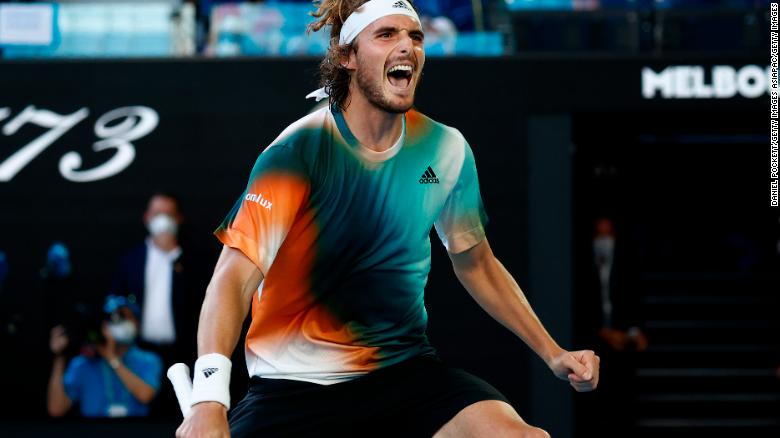 Tsitsipas celebrates victory in his third-round singles match against Paire.