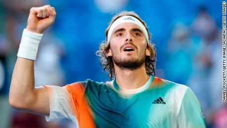 Stefanos Tsitsipas celebrates victory in his third-round singles match against Benoit Paire.
