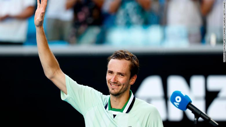 Medvedev acknowledges the crowd after winning his third-round singles match against Botic van de Zandschulp.