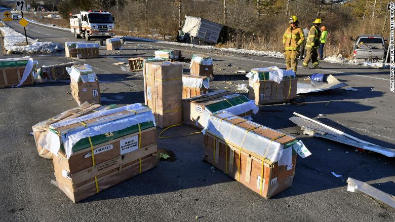 Crates holding live monkeys are scattered across state Route 54 at the junction with Interstate 80 near Danville, Pennsylvania.