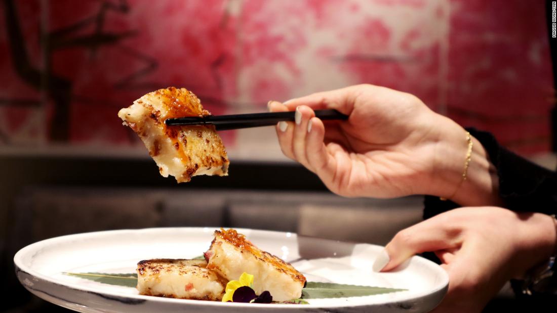 What is turnip cake and why is it a popular Lunar New Year dish?