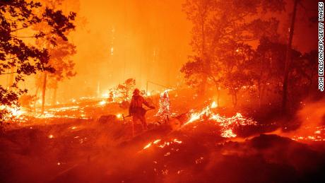 A firefighter works at the scene during the Creek Fire in Madera County, Calif., September 7, 2020.