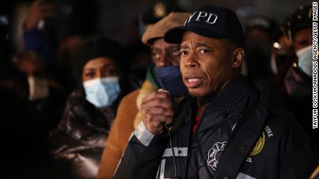 Mayor Eric Adams speaks to hundreds of police and fire officers at a vigil on January 22, 2022, for two officers shot in Harlem 