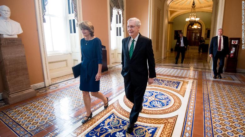 Sen. Lisa Murkowski and McConnell walk to McConnell&#39;s office in the Capitol after a vote in October 2018.