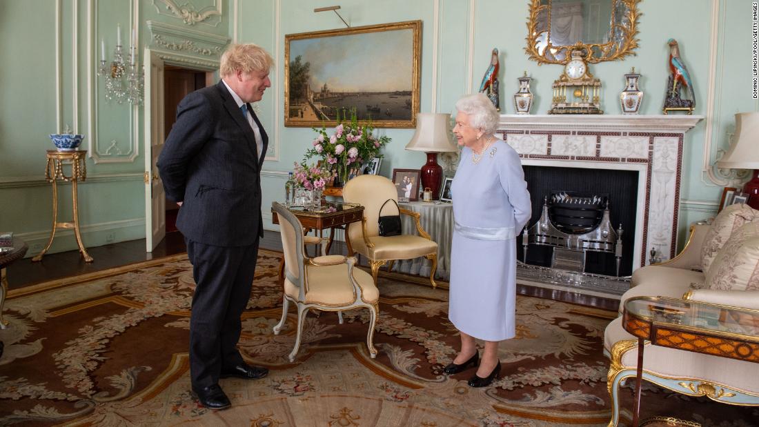 Queen Elizabeth II greets Johnson at Buckingham Palace in June 2021. It was the Queen&#39;s first in-person weekly audience with the Prime Minister since the start of the coronavirus pandemic.