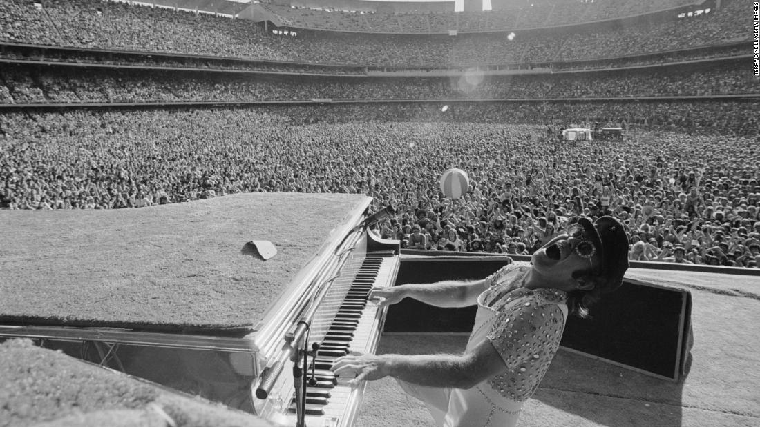 John performs at Dodger Stadium in Los Angeles in 1975. During his career, he has been nominated for 34 Grammy Awards and won five times. He also has an Academy Award and a Tony Award.