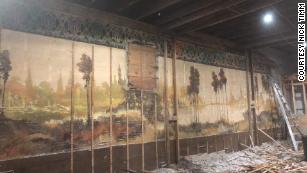 https://cdn.cnn.com/cnnnext/dam/assets/220126164541-03-couple-discovers-mural-renovation-trnd-medium-plus-169.jpg