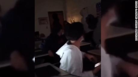 In edited cell phone video provided to CNN, the teacher can be heard yelling at the student and then appears to push him to the ground, according to the sheriff&#39;s office