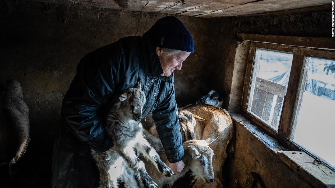 Zoya Kralya, 66, is one of the last remaining residents of Vodyane, Ukraine, a tiny hamlet in the Donetsk area. Ever since her husband died a few years ago, she has lived alone and tends to her goats and a number of dogs and cats. &quot;If there is war, I will shelter in the basement, stocked with food and water in case I have to be underground for weeks,&quot; she told Fadek. &quot;The conflict in 2014 and 2015 was the worst thing I experienced in my life. I don&#39;t want to live through it again.&quot;