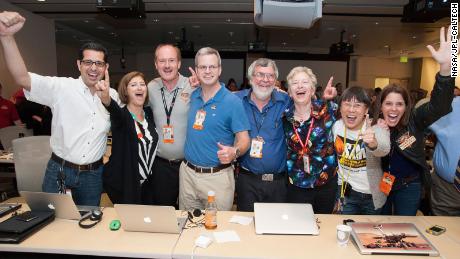 Laurie Leshin (second from left) celebrates the landing of the Curiosity rover on August 5, 2012. Leshin is a co-investigator on two of the rover&#39;s instruments.