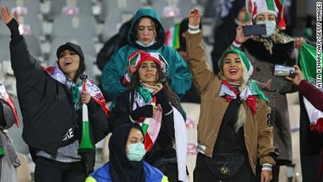 Iran supporters cheer during the 2022 Qatar World Cup Asian Qualifiers match between Iran and Iraq.